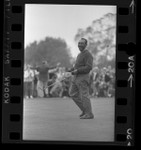 Golfer Charlie Sifford smiling as he wins the 1969 Los Angeles Open