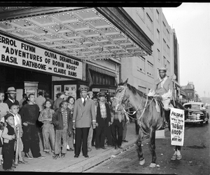 Mr. Miller in front of the Republic Theatre [acetate film photonegative]