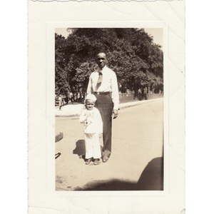 Reverend Laymon Hunter poses with one of his sons