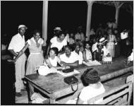 Davison-Paxon Company sponsored segregated staff outings, such as this nighttime picnic for African Americans. An Atlanta, Georgia, park, August 18, 1954