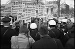 [African American demonstrators outside the White House, with signs "We demand the right to vote, everywhere" and signs protesting police brutality against civil rights demonstrators in Selma, Alabama]