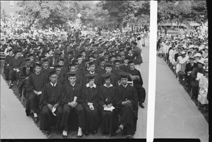 Seated group of men and women in academic dress : acetate film photonegative, banquet camera format.