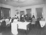 Thumbnail for Girls in sewing class, 1911