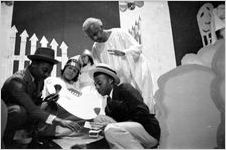 Men shooting dice, scene from the morality play "Heaven Bound," staged by the Big Bethel African Methodist Choir, at the Atlanta Theatre (23 Exchange Place), Atlanta, Georgia, August 1937