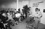 Guy Crowder photography exhibit audience listening to Guy Crowder's presentation, Los Angeles, 1993