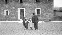 Little Negro children placed by T.C. Walker under State Board. Charities and connections in good country houses. County jail in background