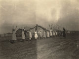 Female students doing calisthenic exercises at Lomax School, an African American school in central Alabama.