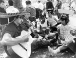 Group under tree at festival