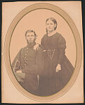 [Unidentified soldier in Union uniform with sword and unidentified woman, probably his wife]