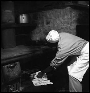 Oliver Jacobs Cooking at a Stove