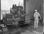 Employee steam cleaning equipment at the Ray-Brooks Machinery Company at 2275 West Fairview Avenue in Montgomery, Alabama.