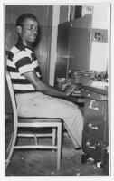 Man at Desk with a Typewriter, circa 1955