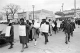 Demonstrators marching toward the Jefferson County Courthouse in downtown Birmingham, Alabama, for a voter registration rally.