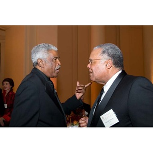 Two men converse at the Museum of Fine Arts during the inauguration celebration for President Aoun