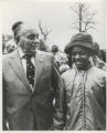 Richard J. Daley talking to a young African American girl