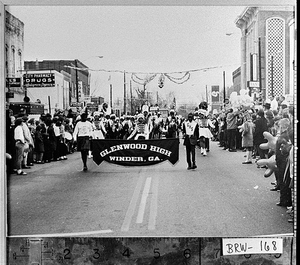 Photograph of the band of Glenwood High School marching in a Christmas parade, Winder, Barrow County, Georgia, 1968