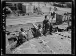 Baltimore, Maryland. Tightening bolts with a pneumatic wrench during the construction of the Liberty ship Frederick Douglass at the Bethlehem-Fairfield shipyards