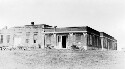 Unidentified building with buggy in front