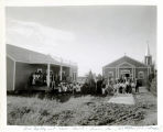 Group Portrait of Rev. Wade, S.V.D., and Congregation, St. Benedict the Moor Church, Duson, Louisiana, Undated