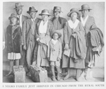 A negro family just arrived in Chicago from the rural South