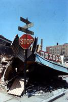 Riots; Detroit; Race Riot.--Windows boarded up - 1 picture.--Stop sign in wreckage - 1 picture.--”Peace on Earth” sign on building - 1 picture.--Used in “A Time of Tragedy”. A special section, Re: Riot. Published by Det. News Aug. 11, 1967.--Enc. 3 negs.