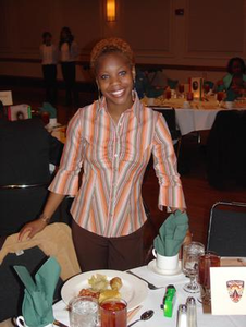 Student standing at her table during BHM banquet 2006