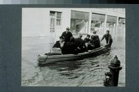 Hurricane of 1938: men and women in boat, Pleasant Street, Hartford