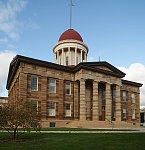 The Old Capitol Building in Springfield, the capital city of Illinois. It is the fifth capitol building built for the U.S. state of Illinois. It was constructed in the Greek Revival style in 1837-1840 and served as the state house from 1840 to 1876. It is the site of presidential candidacy announcements by Abraham Lincoln in 1858 and Barack Obama in 2007. Here, Lincoln tried cases as a lawyer and delivered his famous "House Divided" speech in 1858