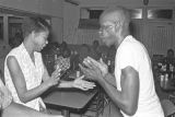 Man and woman dancing at Tom's Place at 648 South Holt Street in Montgomery, Alabama.