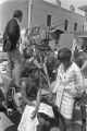 CBS camera crew filming Martin Luther King, Jr.'s funeral from the back of a pickup truck.