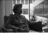 Margaret Walker Alexander with letters, Donald Gallup, in office at Beincke Library at Yale University, 1978.(YSP 25-78-4)