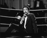 Richard Pryor performing while sitting in a boxing ring