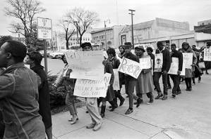 Demonstrators marching toward the Jefferson County Courthouse in downtown Birmingham, Alabama, for a voter registration rally.