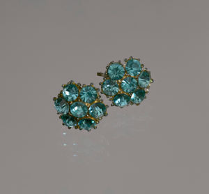 Thumbnail for Pair of teal rhinestone flower earrings from Mae's Millinery Shop