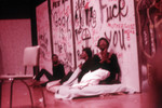 Thumbnail for Performance: three actors sitting in front of graffiti backdrop