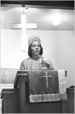 Coretta Scott King speaking to an audience of women at Hall Street Baptist Church in Montgomery, Alabama.