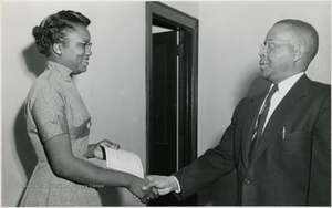 Female Student Accepts Certificate from Faculty Member, Storer College, Harpers Ferry, W. Va.