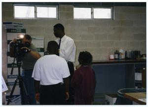 Gates Elementary Students and Teacher Inside Urban Communications Inc. Facility