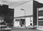 Putting up signage before the opening of the Fox Trap, 14 N. 5th St., Minneapolis, about 1979