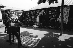 Appliqué workers, in street, Abomey, Benin