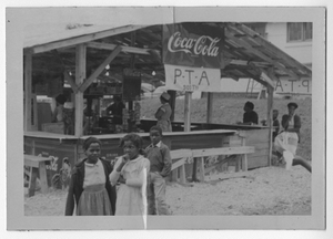 Photograph of the parent teacher association booth at the fair, Manchester, Georgia, 1953