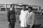 City Farm market representatives standing together in their parking lot, Los Angeles, 1986