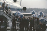 Martin Luther King, Jr., getting off a plane at the airport in Birmingham, Alabama.