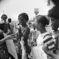 Civil rights activists Rachel Nelson and Sheyann Webb demonstrating at a Ku Klux Klan march in Selma, Alabama.