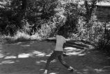 Boy playing baseball.