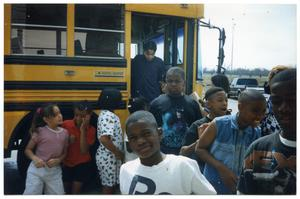 Boys and Girls Getting out of Bus