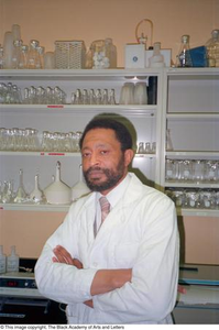 Photograph of Dr. Edison Fowlks with his biology equipment