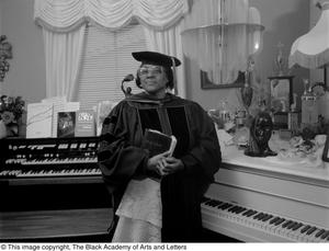 Photograph of Francine Morrison holding her holy bible