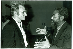 Larry Rivers talking to Amiri Baraka at his opening