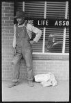 [Untitled photo, possibly related to: Negro farmer with supplies in town, San Augustine, Texas]